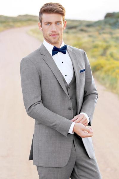 Dare to be different when you choose the Heather Grey Clayton suit - also known as Linen Grey. Its ultra slim styling is tailored to fit all body types - including big and tall sizes. Constructed of Super 130's wool fabric, it's the most comfortable fit and feel in our line. The Clayton features a self-framed notch lapel and double besom pockets. Pair it with a matching pair of ultra slim fit pants with no stripe and a matching wool vest for the ultimate three-piece look.