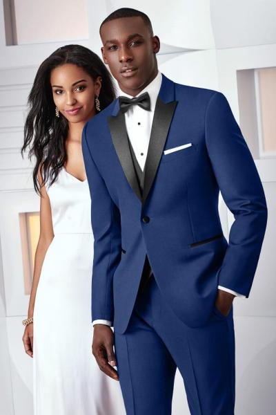 Make a statement with the Cobalt Blue Tribeca at your next formal affair. The ultra slim fit styling is tailored to fit all body types - including big and tall sizes. The Tribeca is tailored in a soft, luxurious Super 120's wool fabric. It features a black satin peak lapel, black satin double besom pockets and black satin covered buttons. Pair it with a pair of matching or black ultra slim fit pants for a trim and tapered styling.