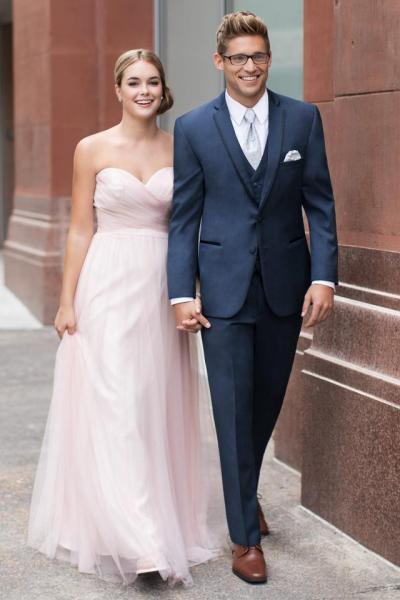 For a polished look, the Slate Blue Aspen tuxedo is a stylish choice. Tailored in 100% worsted wool with a slim fit styling, it's contemporary notched lapels edged in satin add a touch of luxury to this fashion- forward style. Pair with matching flat front, modern slim fit pants and a matching fullback vest for a 3-piece tuxedo look.