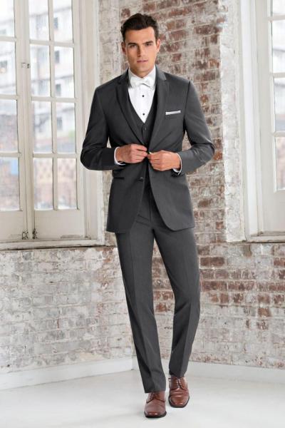 A contemporary style with a trim and tapered fit, the Ultra Slim Steel Grey Sterling Wedding Suit is one of our slimmest fitting garments. Details such as the self-framed notch lapel, elegant purple satin lining and matching ultra slim fit pants with an adjustable waist, belt loops and buttons to accommodate suspender set this suit apart from the others. Pair it with a matching wool vest for a 3-piece look. Also available in slim fit styling to accommodate all the members of your party.